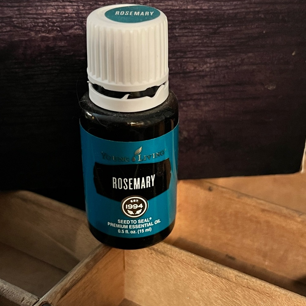 Young Living Rosemary Oil in Black and Blue Bottle